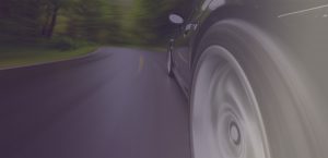 car driving down a road