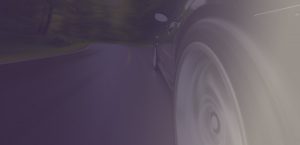 car driving down a road